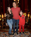 <p>Mario Lopez and his daughter Gia, 12, and son Dominic, 9, smile together at the <i>Christmas Spectacular Starring the Radio City Rockettes</i> at New York's Radio City Music Hall on Nov. 26.</p>