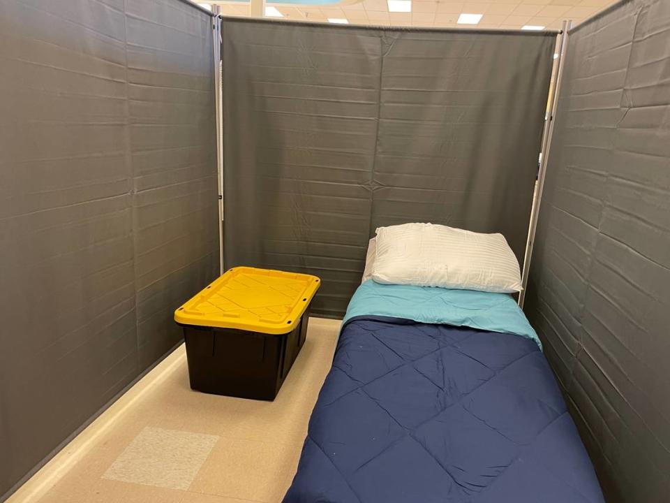 Inside the temporary homeless shelter in Elk Grove, which will be open from Wednesday, Nov. 1, through March 31, 2024, each occupant has a cot and a storage bin.
