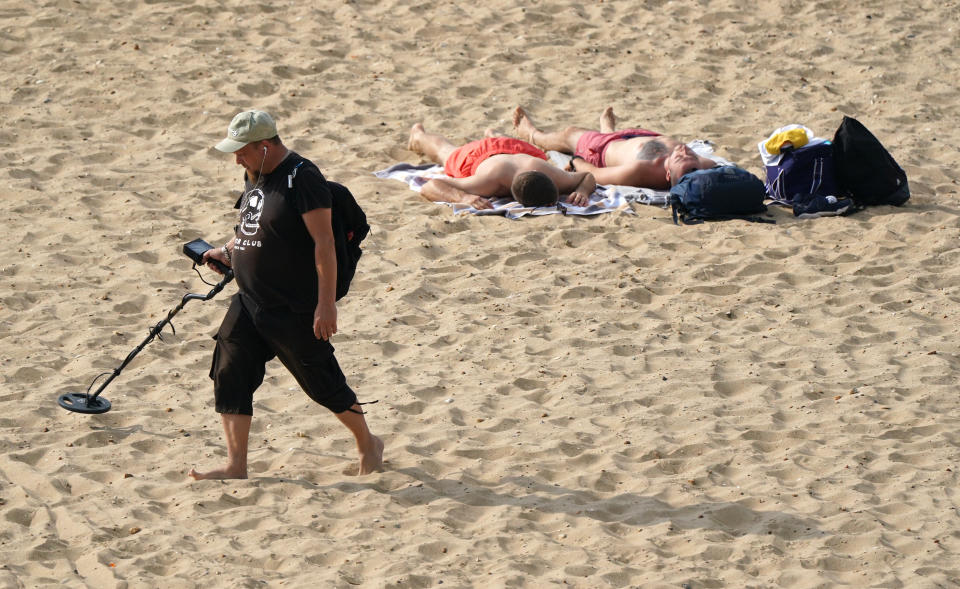 <p>People enjoy the warm weather on Bournemouth Beach in Dorset. Picture date: Wednesday September 8, 2021.</p>
