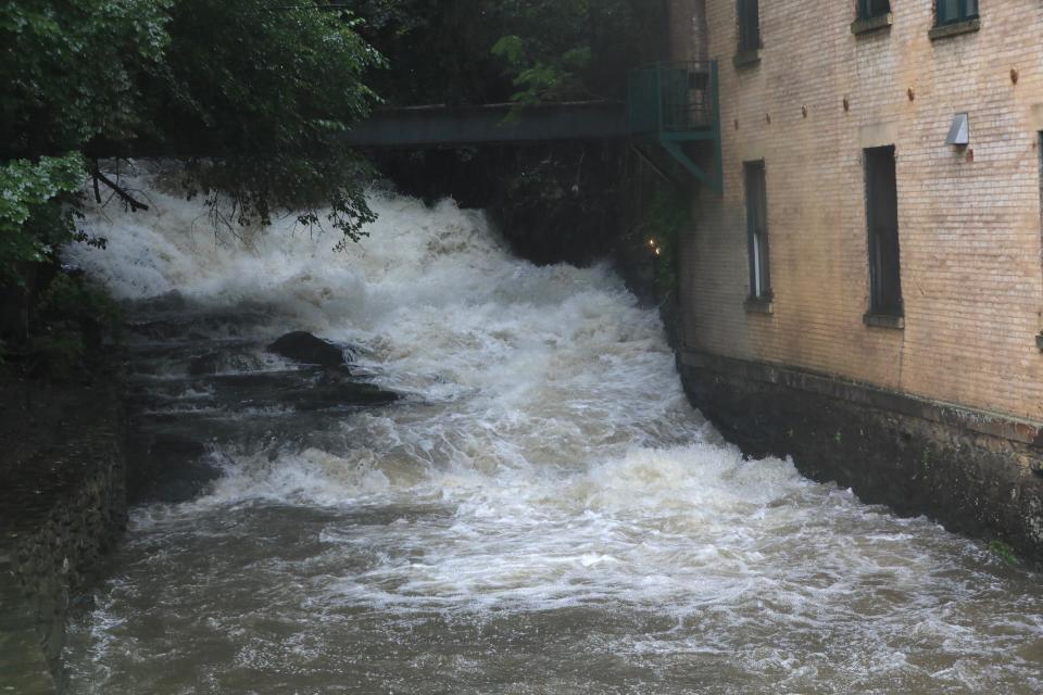 The Fallkill Creek rushes toward the Hudson River near Water Street in the City of Poughkeepsie on September 29, 2023. Heavy rains on Friday and Saturday are expected to cause flooding.