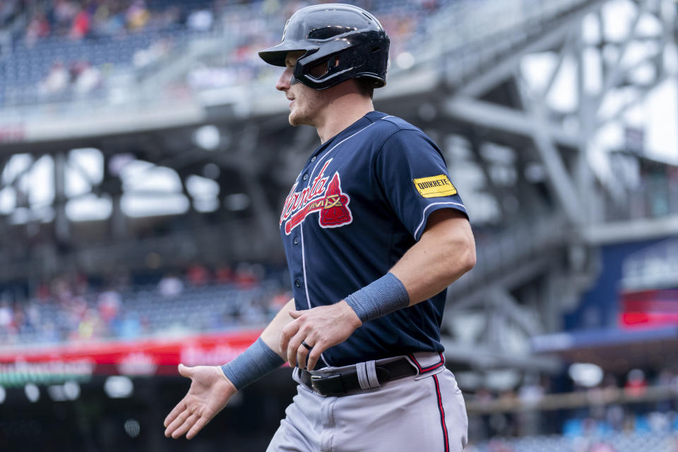 Atlanta Braves' Sean Murphy celebrates after scoring on a sacrifice fly hit in by Braves' Kevin Pillar during the second inning of a baseball game against the Washington Nationals, Sunday, Sept. 24, 2023, in Washington. (AP Photo/Stephanie Scarbrough)