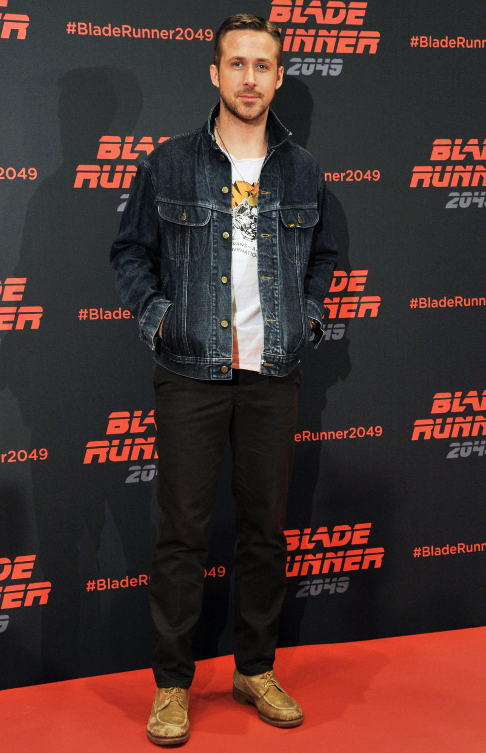 <p><strong>19 June</strong> Ryan Gosling kept it casual while attending a <em>Blade Runner: 2049</em> photo call in Spain wearing double denim, a white graphic T-shirt and brown shoes. </p>