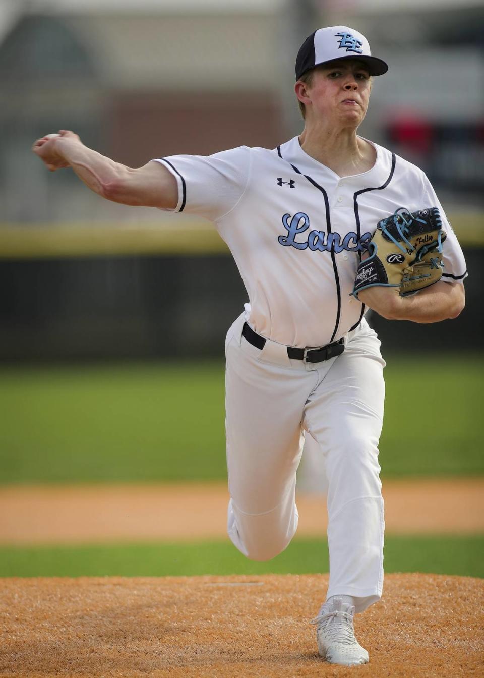 Belleville East starting pitcher Owen Kelly delivers a pitch during a Southwestern Conference game against Belleville West earlier this season. Kelly — who earned the win in that game — is one of the key hurlers on a talented Lancers pitching staff.