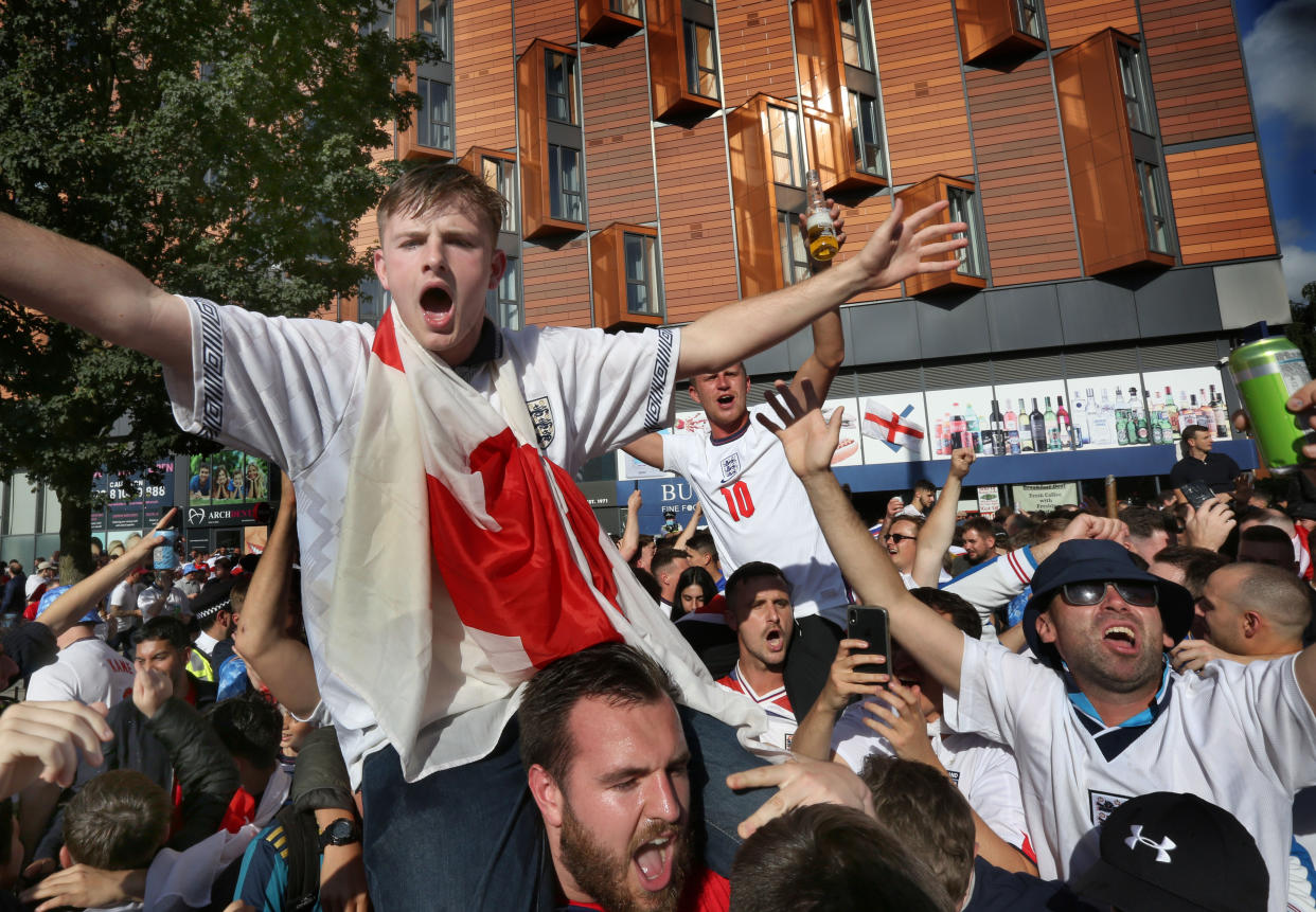  Fans chant slogans watch the Euro 2020 semi-final final match between England and Denmark.
After 55 years without a major football trophy England fans watch the euro 2020 semi-final final match between England and Denmark at Wembley. After a 2-1 win they move on to the final against Italy. (Photo by Martin Pope / SOPA Images/Sipa USA) 