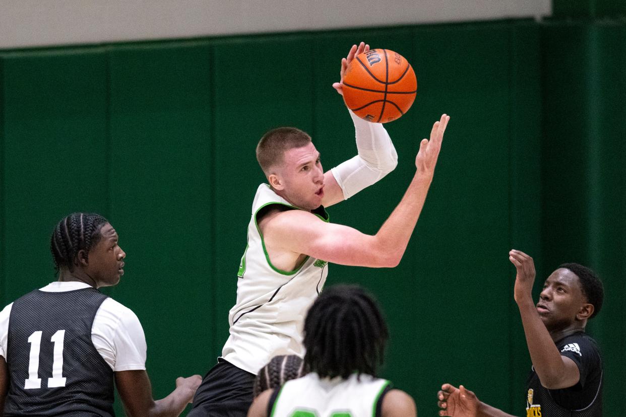 Westfield High School's Nic Book (40) pulls in a rebound during Charlie Hughes Shootout basketball action, Saturday, June 24, 2023, at Westfield High School.