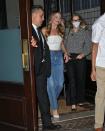 <p>Robbie repurposed her bridal-inspired Chanel Resort 2023 dress following the Amsterdam premiere by styling the strapless ruched top top part of the look with a pair of baggy jeans and white stilettos. </p>