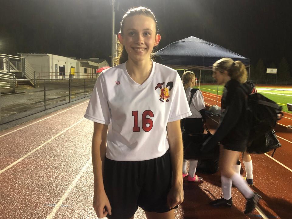 Yreka senior defender Mattie Whipple holds her hands in a fist after playing a rainy game against Lassen on Saturday, Dec. 10, 2022.