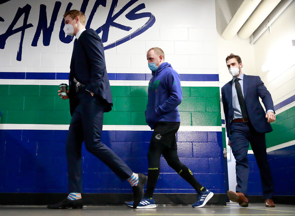 The Vancouver Canucks won't be seeing any games for a while as the team is battling maybe the worst COVID-19 outbreak to hit professional sports. (Getty)