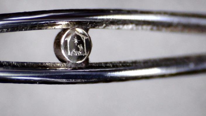 Nativity scene in the eye of a needle