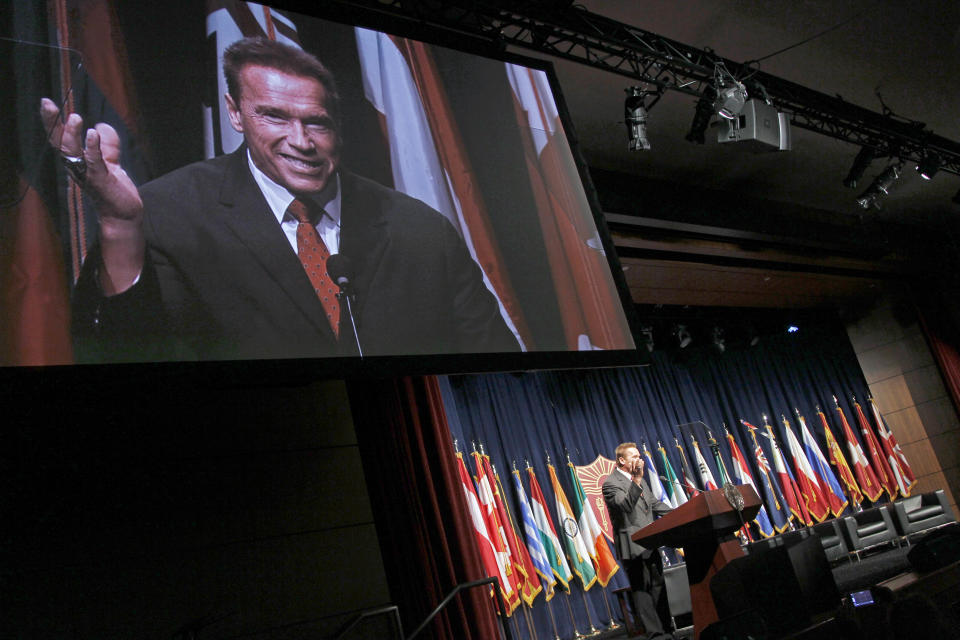 Former California Gov. Arnold Schwarzenegger delivers the keynote address at the inaugural symposium sponsored by the Schwarzenegger Institute for State and Global Policy, at the University of Southern California in Los Angeles Monday, Sept. 24, 2012. (AP Photo/Reed Saxon)