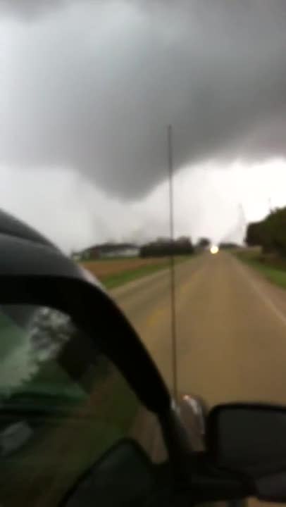  Severe storms swept through portions of Illinois on November 17, bringing with them damaging tornados which left a trail of destruction in several communities. This footage shows a tornado passing by in Braidwood, Illinois. Credit: Riley Johnson. 