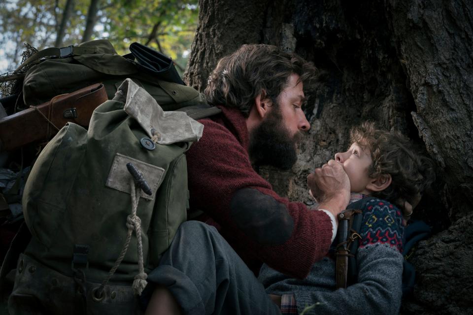 John Krasinski, left, and Noah Jupe in a scene from "A Quiet Place."