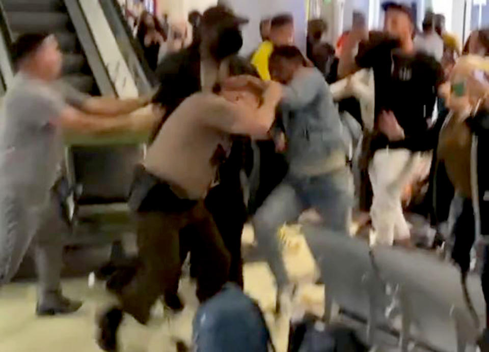 A fight broke out Monday between members of the public and police officers at Miami International Airport.  (Courtesy Mike Majlak)