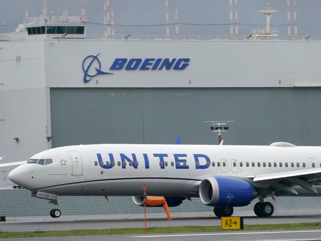 A Boeing 737 Max 9 built for United Airlines landing at King County International Airport (AP)