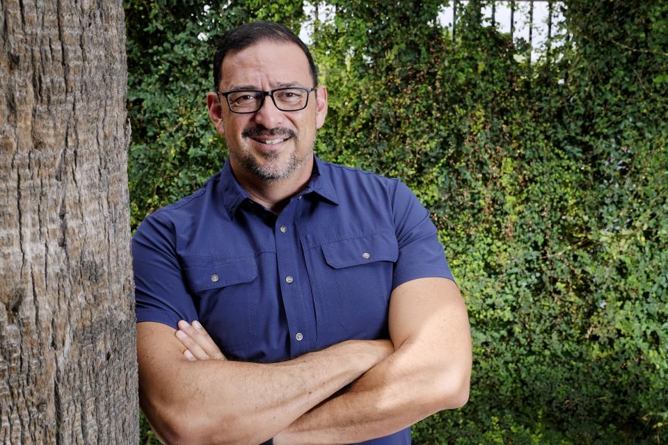 Adrian Fontes, a Democratic candidate running for Secretary of State for Arizona, poses for a photograph Friday, July 29, 2022, in Phoenix. (AP Photo/Ross D. Franklin)