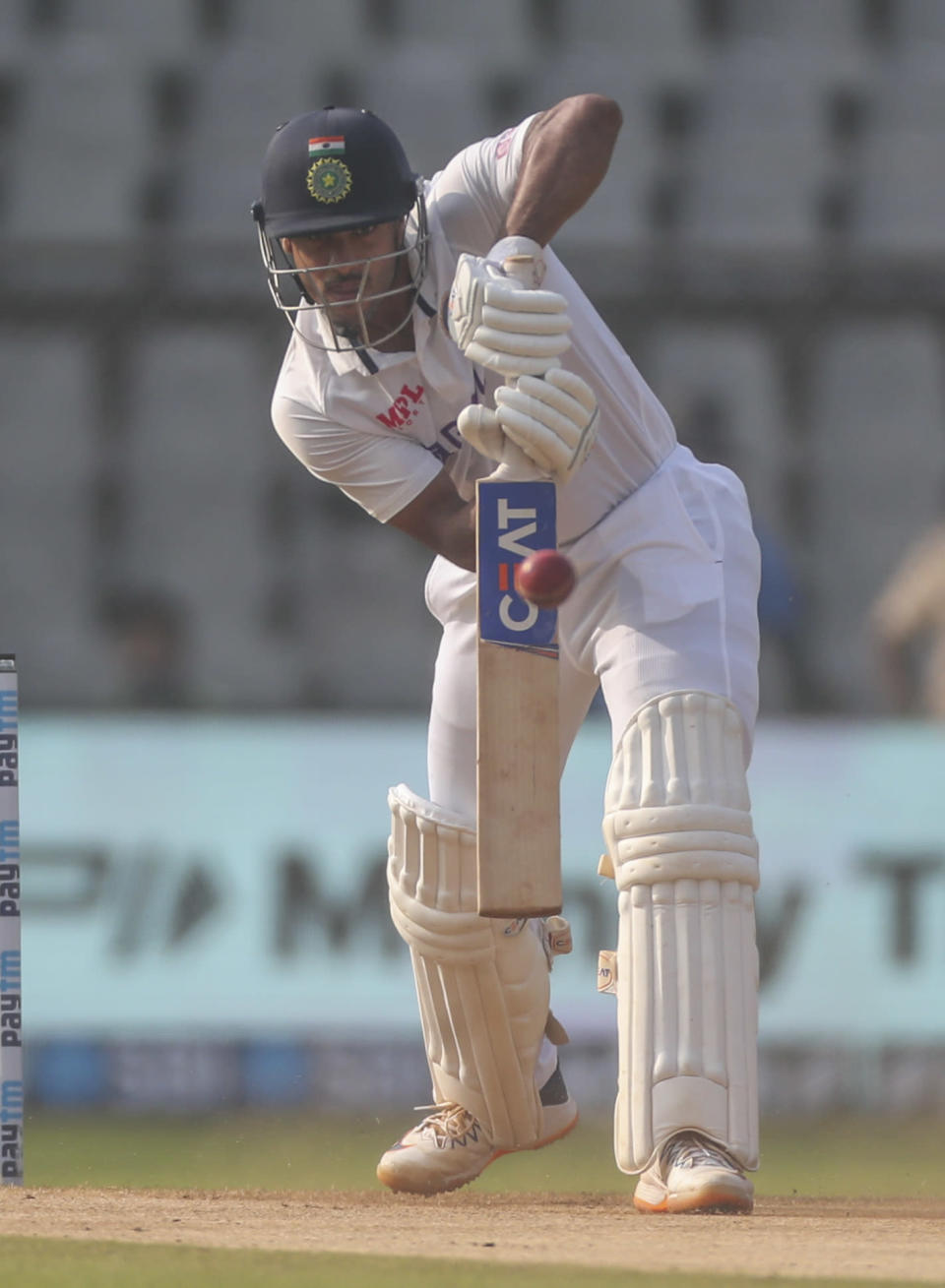 India's Mayank Agarwal plays shot during the day three of their second test cricket match with New Zealand in Mumbai, India, Sunday, Dec. 5, 2021.(AP Photo/Rafiq Maqbool)