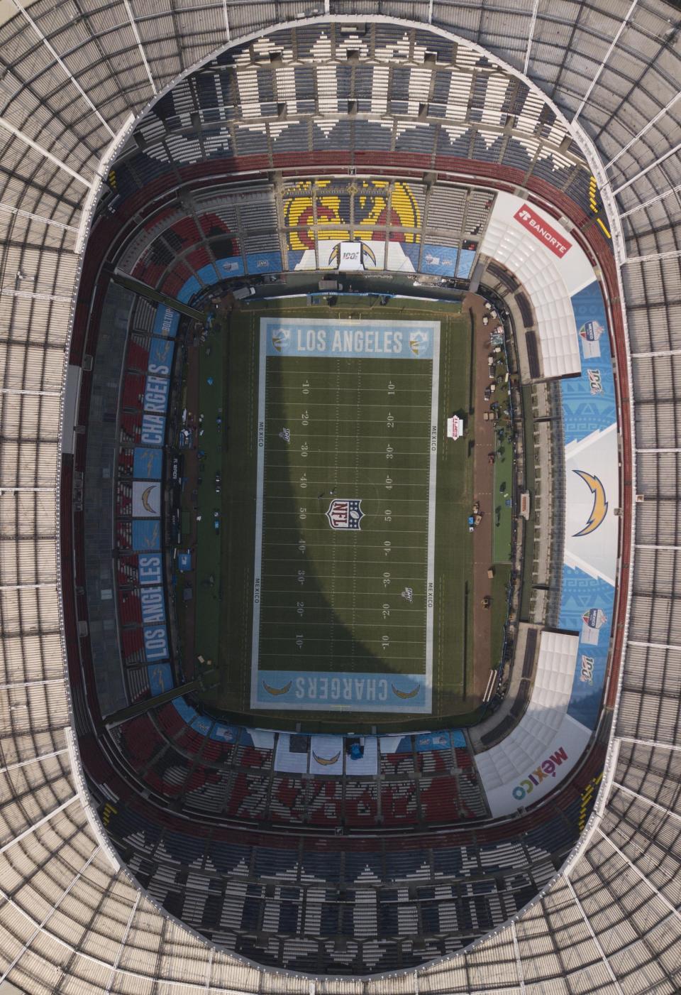 An aerial view of the Azteca Stadium in Mexico City, Saturday, Nov. 16, 2019, where the Kansas City Chiefs and Los Angeles Rams will face off for a regular-season Monday Night Football game. Heavy rain and heavy use last year left the grass unfit for the AFC matchup, forcing the Chiefs-Rams game to be relocated to Los Angeles. (AP Photo/Christian Palma)