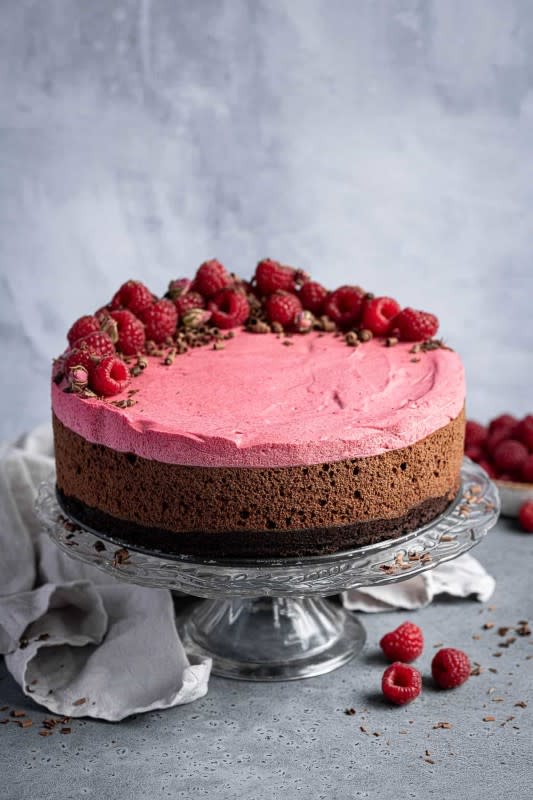 <p>Domestic Gothess</p><p>Vegan chocolate raspberry mousse cake—layers of dark chocolate mousse and vegan white chocolate raspberry mousse sit on top of a layer of rich, moist chocolate cake.</p><p><strong>Get the recipe: <a href="https://domesticgothess.com/blog/2021/11/24/chocolate-raspberry-mousse-cake/" rel="nofollow noopener" target="_blank" data-ylk="slk:Chocolate Raspberry Mousse Cake;elm:context_link;itc:0;sec:content-canvas" class="link ">Chocolate Raspberry Mousse Cake</a></strong></p>