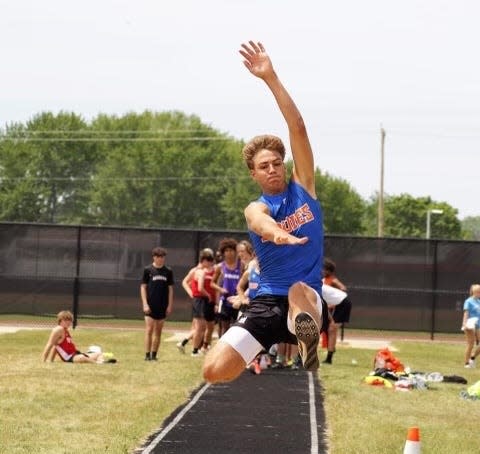 Edwardsburg's Luke Stowasser won a state title in the long jump during the Michigan High School track & field championships Saturday at Zeeland High School near Holland, Mich.