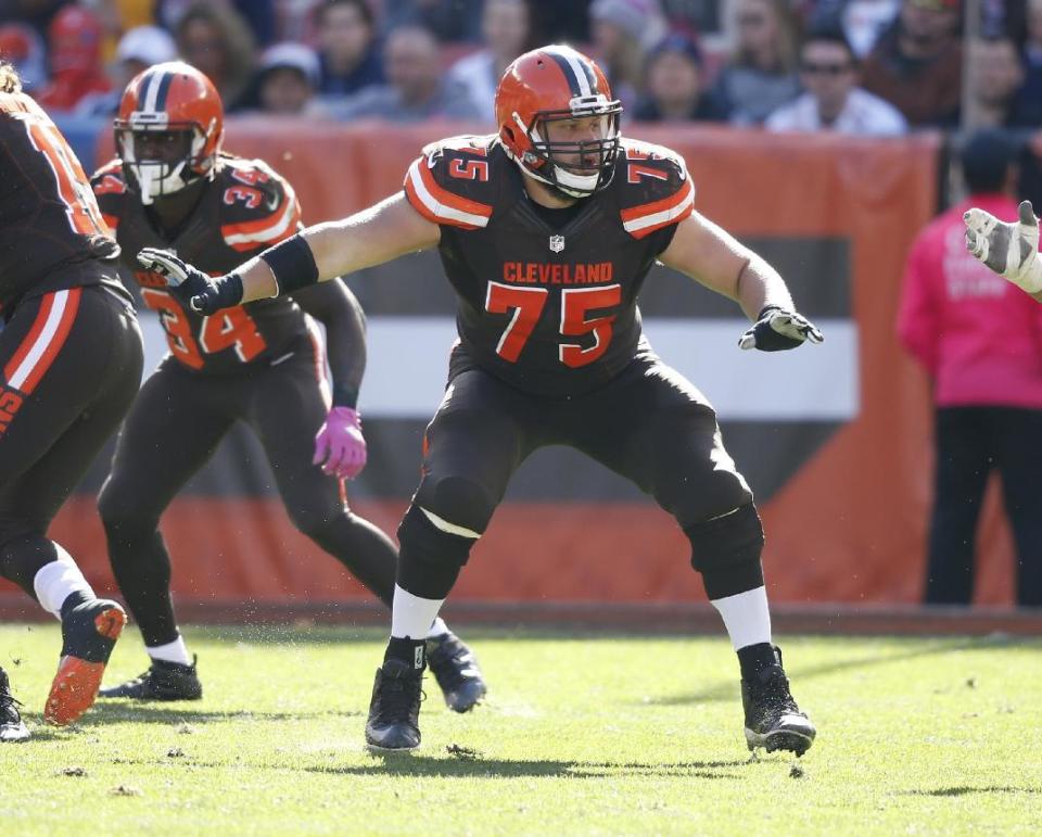 FILE - In this Oct. 9, 2016, file photo, Cleveland Browns' Joel Bitonio looks to block against the New England Patriots during the second half of an NFL football game, in Cleveland. Cleveland Browns guard Joel Bitonio has signed a multi-year contract extension. Bitonio has developed into one of the NFL’s best young interior lineman since Cleveland drafted him in 2014 and the Browns wanted to secure a player with Pro Bowl potential. (AP Photo/Ron Schwane, File)