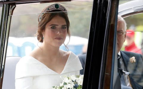 The bride, Princess Eugenie, arrives - Credit: Getty