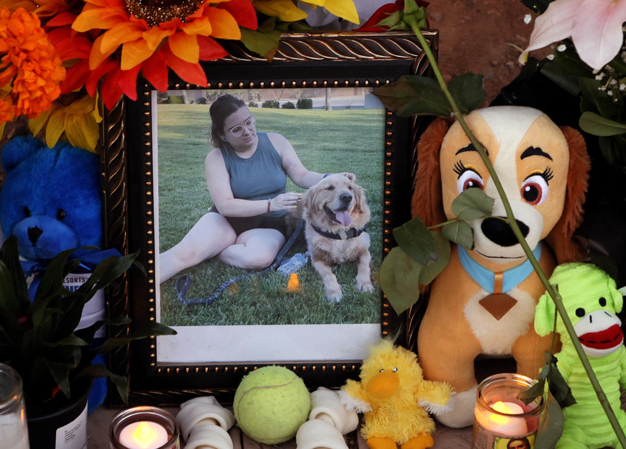 A roadside memorial near the Las Vegas crash site includes a photo of Tina Tintor and her dog Max. (Ethan Miller/Getty Images)