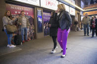 <p>Yahoo Global News Anchor Katie Couric walks with Olympic gold medalist Simone Biles in New York City’s Theater District on Nov. 18. (Gordon Donovan/Yahoo News) </p>