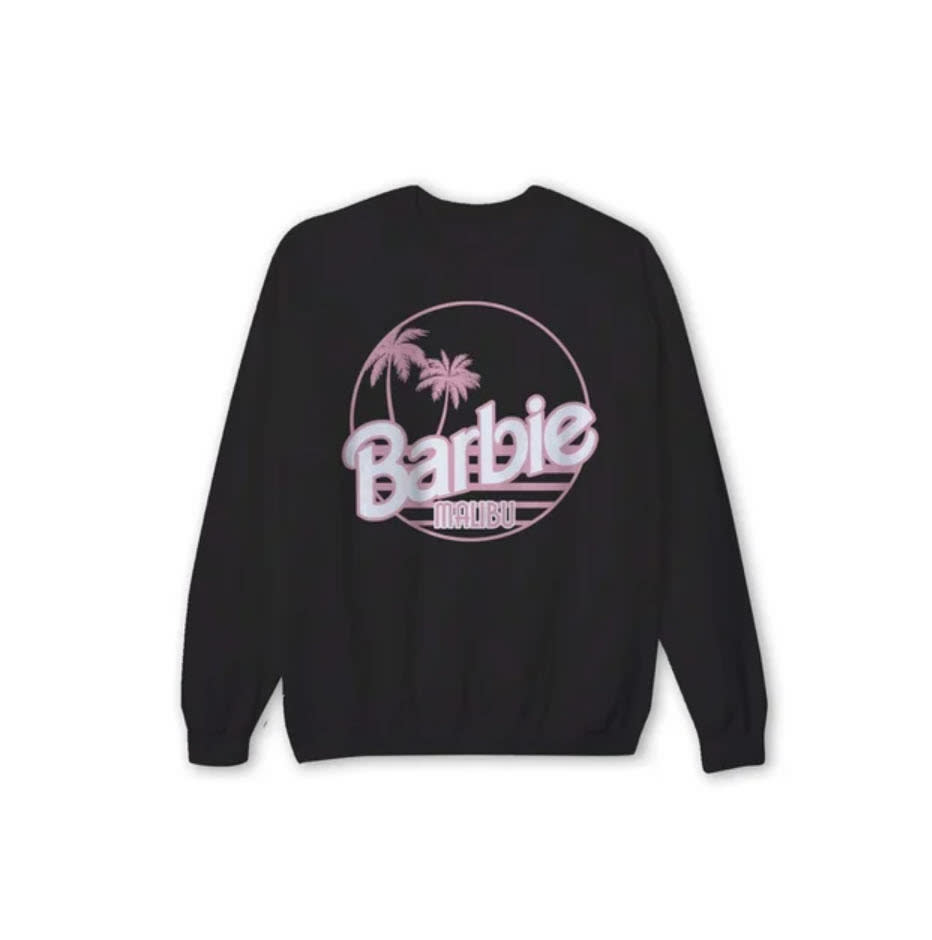 Back of a black sweatshirt with a pink and white "Barbie" logo featuring palm trees