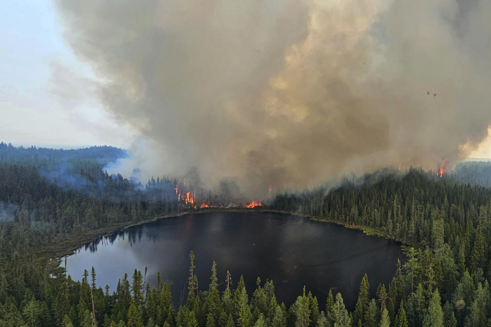 In this image released by the Ontario Ministry of Natural Resources and Forestry, the Chapleau 3 wildfire burns near the township of Chapleau, Ontario, on Sunday, June 4, 2023. (Ontario Ministry of Natural Resources and Forestry/The Canadian Press via AP)