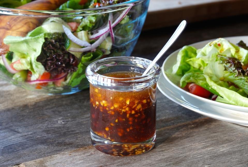 <p>Weekend at the Cottage</p><p>Chopped garlic whisked together with soy, chili flakes, toasted sesame oil and rice wine vinegar.</p><p><strong>Get the recipe: <a href="https://weekendatthecottage.com/asian-salad-dressing/" rel="nofollow noopener" target="_blank" data-ylk="slk:Asian Salad Dressing;elm:context_link;itc:0;sec:content-canvas" class="link ">Asian Salad Dressing</a></strong></p>