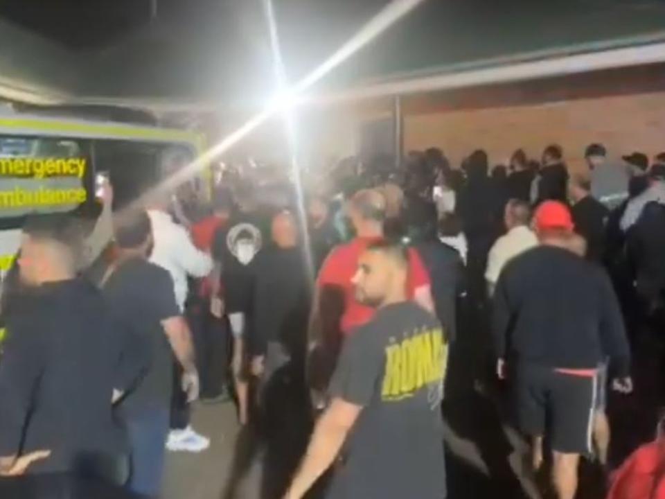 Angry crowds gathered in southwestern Sydney following the alleged stabbing attack.