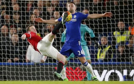 Football Soccer - Chelsea v Manchester United - Barclays Premier League - Stamford Bridge - 7/2/16 Manchester United's Wayne Rooney and Chelsea's Tim Cahill Action Images via Reuters / John Sibley Livepic