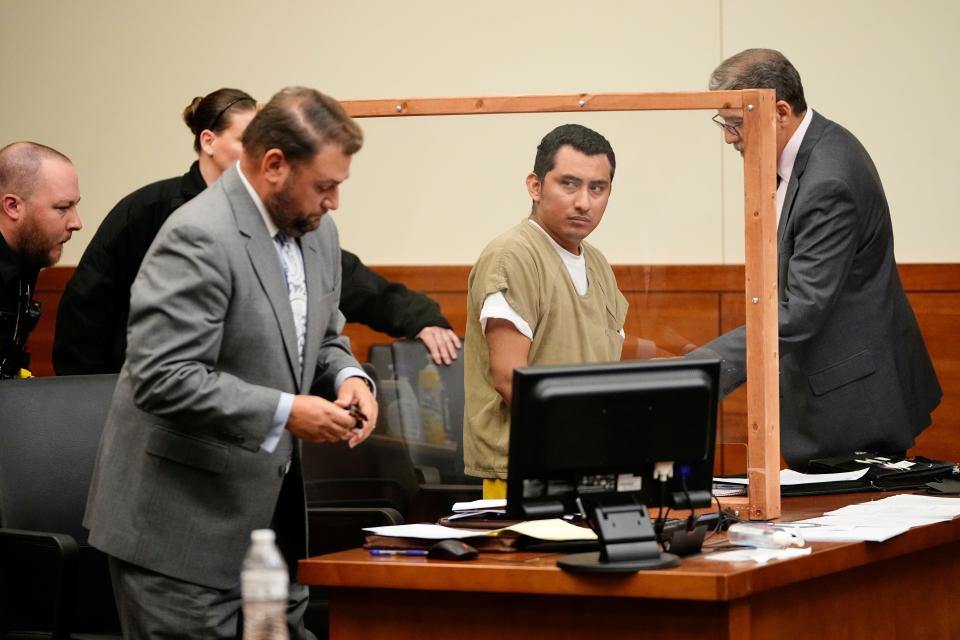 Jul 5, 2023; Columbus, Ohio, USA; Gerson Fuentes, the man who pleaded guilty to raping and impregnating a 10-year-old Columbus girl before she traveled to Indiana for an abortion, appears before Franklin County Common Pleas Judge Julie Lynch alongside defense attorney Zach Olah, left, and translator Wolfgang Salazar.