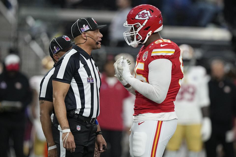 Kansas City Chiefs defensive tackle Chris Jones, right, talks with officials during the first half of the NFL Super Bowl 58 football game against the San Francisco 49ers on Sunday, Feb. 11, 2024, in Las Vegas. (AP Photo/Brynn Anderson)