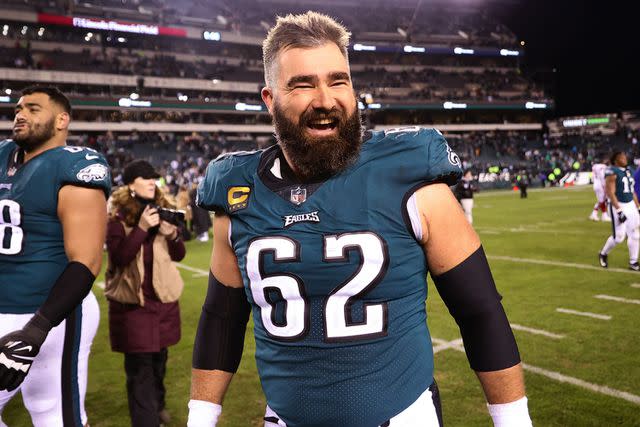 <p>Tim Nwachukwu/Getty</p> Jason Kelce #62 of the Philadelphia Eagles celebrates on the field after defeating the New York Giants 38-7 in the NFC Divisional Playoff game