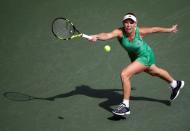 Tennis - Pan Pacific Open Women's Singles Final match - Ariake Coliseum, Tokyo, Japan - 25/09/16. Caroline Wozniacki of Denmark returns the ball against Naomi Osaka of Japan. REUTERS/Issei Kato