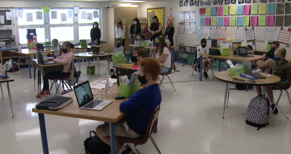 Students in Broward County public schools sit in socially distanced classes after school returned to in-person classes in October 2020.