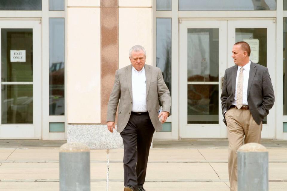 Ted Cain and co-defendant Tommy Kuluz, right, leave the federal courthouse in Gulfport during a break in a 2020 civil trial where a jury found they committed Medicare fraud by paying Cain and his wife salaries they did not earn at his Stone County Hospital. Kuluz is chief financial officer of a Cain company that managed the hospital, now leased to Gulfport Memorial as Memorial Hospital Stone County.