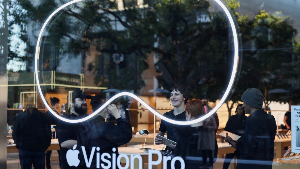 Employees stand in an Apple store on the day Apple's Vision Pro headset goes on sale for the first time in Los Angeles, California, on February 2, 2024. - Mike Blake/Reuters