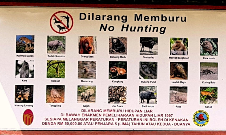 Sign warning against hunting.