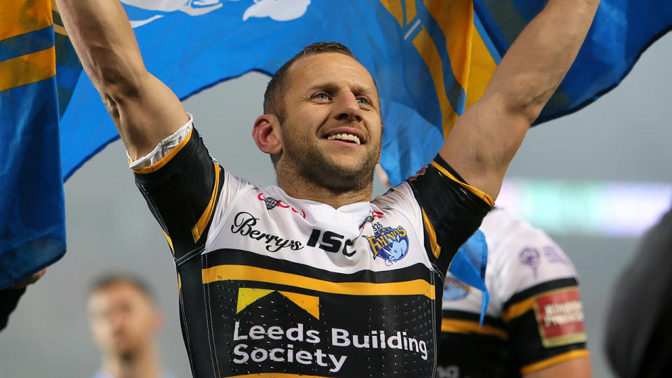 Rob Burrow, pictured here after celebrating after winning his eighth Super League title.