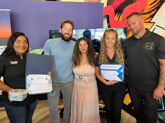 Finalists in The Pitch competition (from left) were Michaela Stubbs, owner of Cashai Beauty; Michael and Natalie Hasselback, owners of Outpour Coffee; Brandy and Kris Kreider, owners of Affinity Event Rentals.