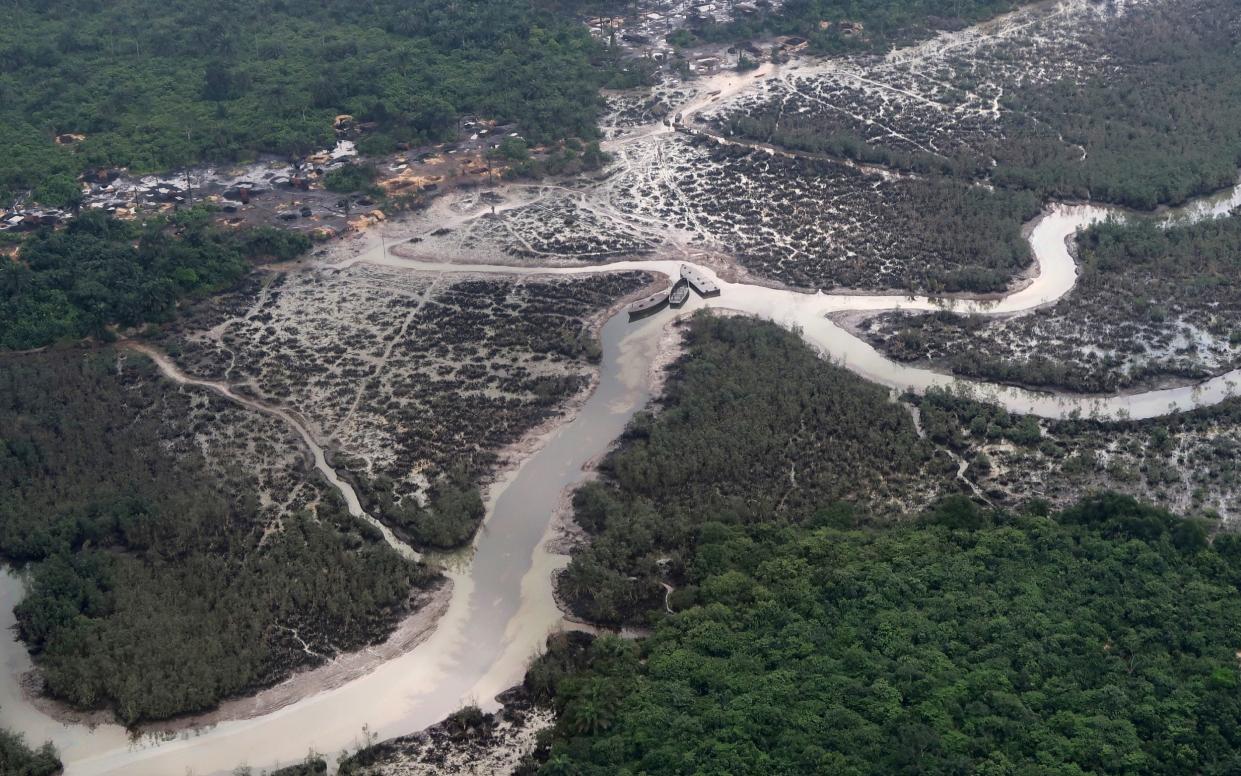 An overview of the Niger delta where signs of oil spills can be seen in the water in Port Harcourt, Nigeria - Ron Bousso/REUTERS