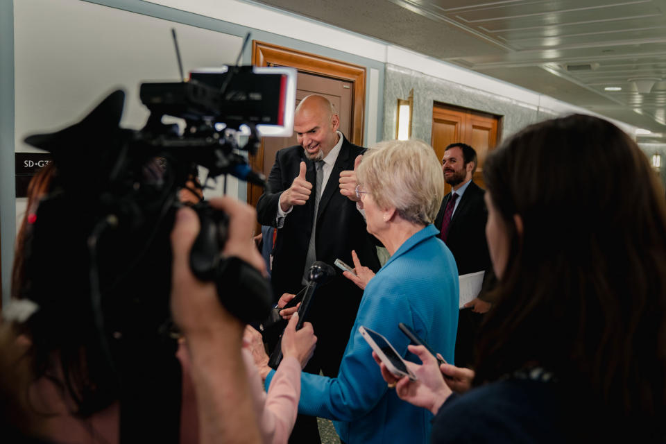 Fetterman gives a thumb up to Sen. Elizabeth Warren as she speaks to reporters on Capitol Hill<span class="copyright">Shuran Huang for TIME</span>