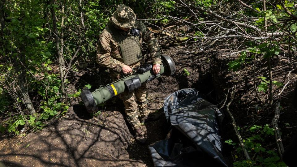 A Ukrainian soldier places an American-made Javelin missile in a fighting position on the front line on May 20, 2022, in the country's oblast of Kharkiv. (John Moore/Getty Images)