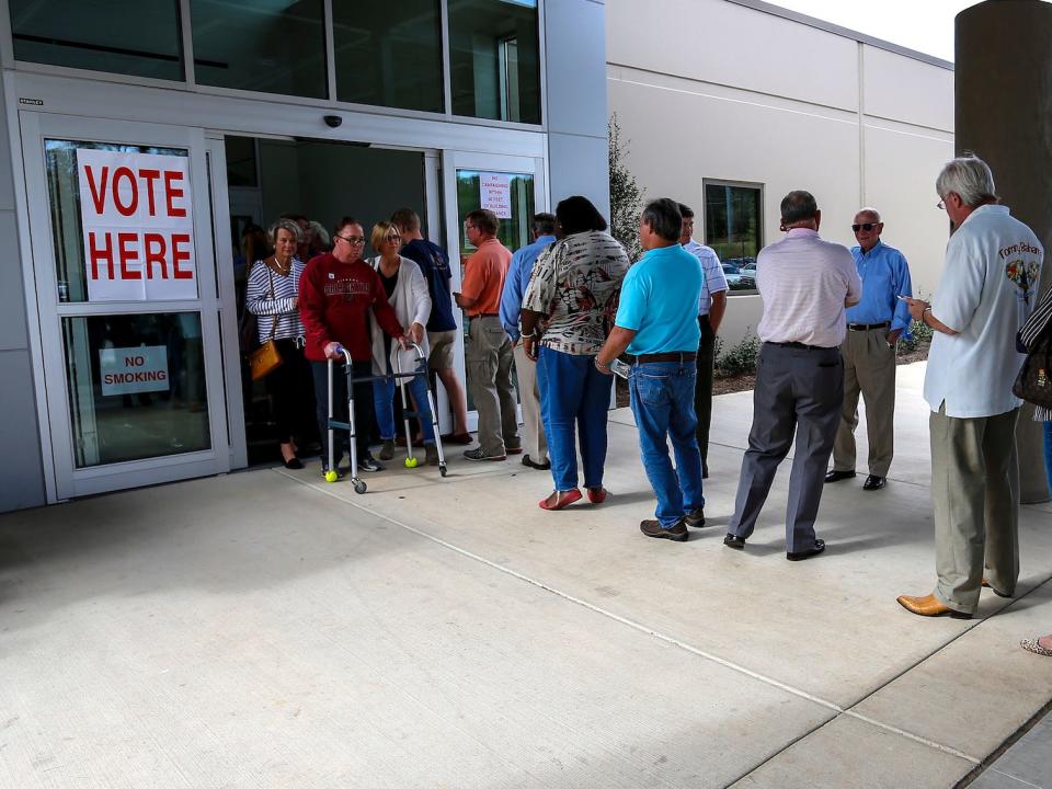 Voters wait in long lines to cast their vote in Tuscaloosa, Alabama.