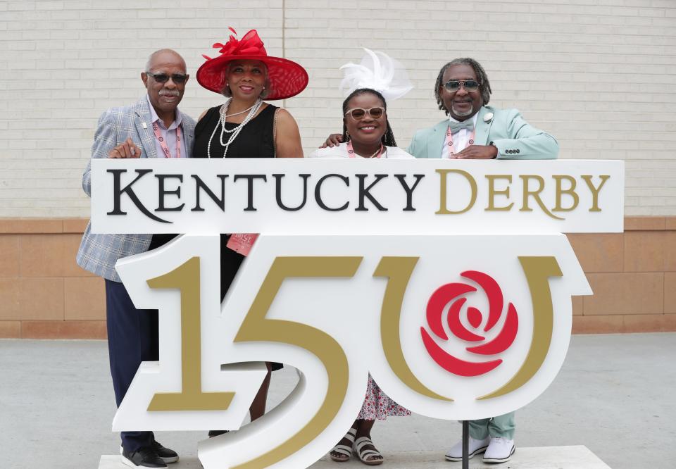 (L-R). Bobby Williams and his wife Gloria Williams along with Pamela Woods and her husband Donald Woods stood at the Kentucky Derby 150 sign as they arrived for the Kentucky Derby in Louisville, Ky. on May. 4 2024.