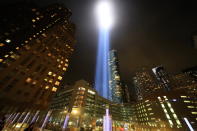 <p>The Tribute in Light rises above the New York City skyline from the entrance of the Battery Tunnel, Sept. 11, 2018. (Photo: Gordon Donovan/Yahoo News) </p>