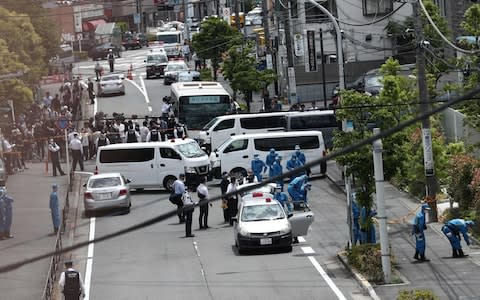The attack occurred during the busy early morning commute as workers headed to their offices and children to school in Kawasaki, a city south of Tokyo. - Credit: AFP