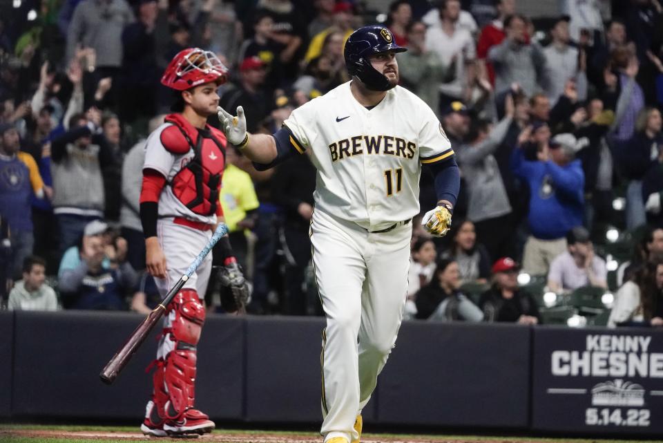 Milwaukee Brewers' Rowdy Tellez hits a grand slam during the third inning of a baseball game against the Cincinnati Reds Wednesday, May 4, 2022, in Milwaukee. (AP Photo/Morry Gash)